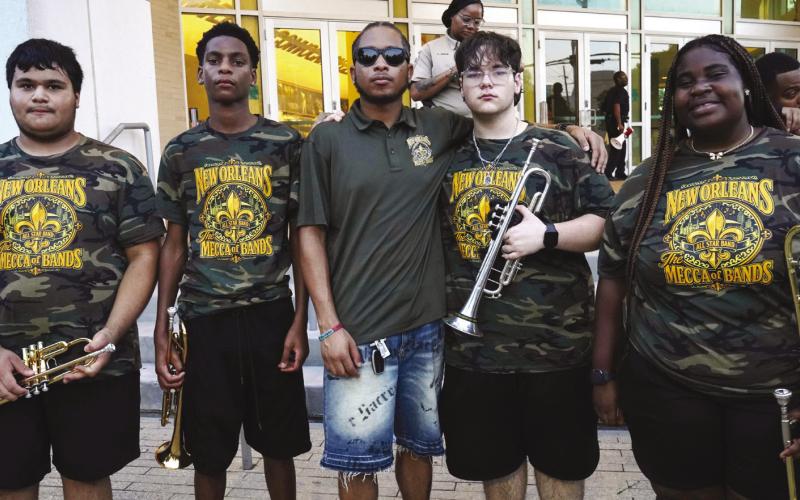 Ronaldo, Stephen, Mark, and Natalia with Raheim Mitchell, Asst. Band Director, NOASB.