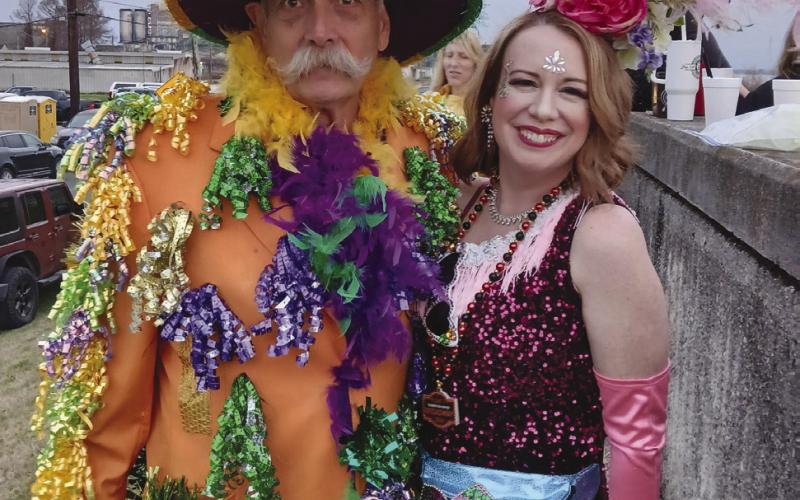 Jimmy Delery and Dr. Katherine Lemoine pose for a photo during the Arabi Lundi Gras Walking Parade.
