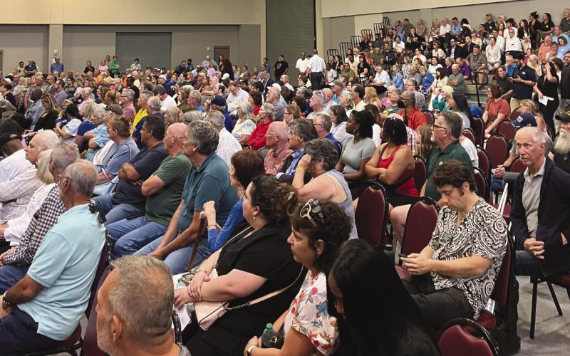 Residents pack into Val Reiss Sports Complex to participate in USACE public hearing on LIT permit.