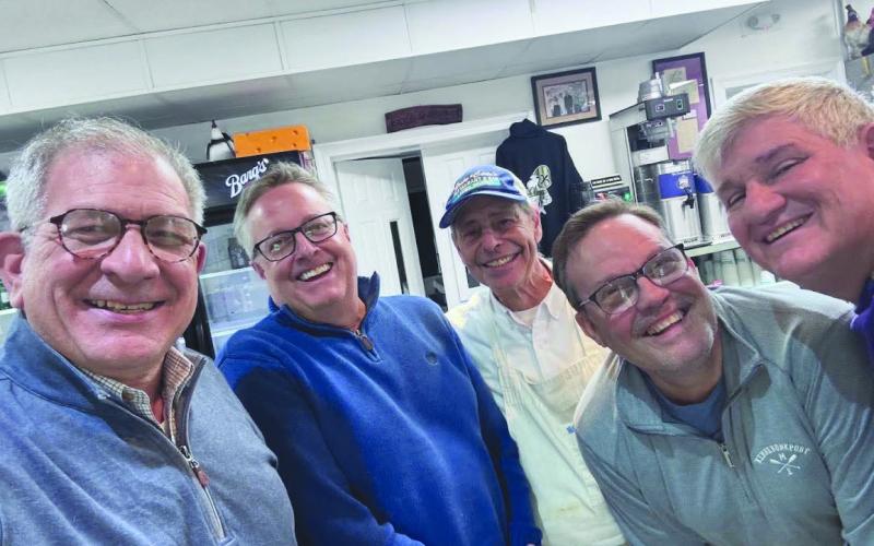 Doug Mouton (second from left) is the new host for WWL Louisiana Morning News. He comes to the parish often to visit friends, enjoy Rocky and Carlos, and chatting with owner, Tommy Tommaseo.