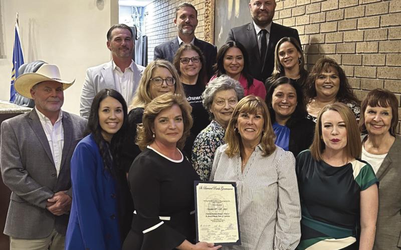Parish President Pomes and council members present National Business Women’s Week proclamation to representatives of the St. Bernard Business and Professional Women's Club.