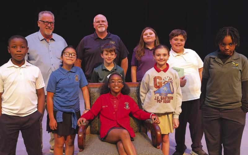 Front row, seated: Kelci Gardner. Second row left to right: Tevaun King, Arianny Sanchez, Thomas McMullin, Alyssa Franatovich, Ryann Littles. Back row left to right: Chris Haines and Bill Haines of the Meraux Foundation, Isabella Thiel, Benjamin Reeks.