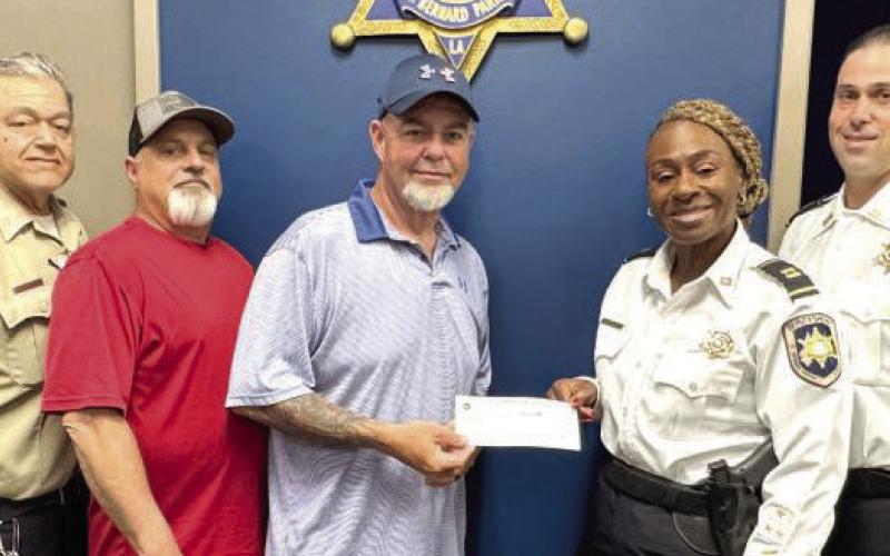 DARE Program Receives Donation from Kids Fishing Rodeo
