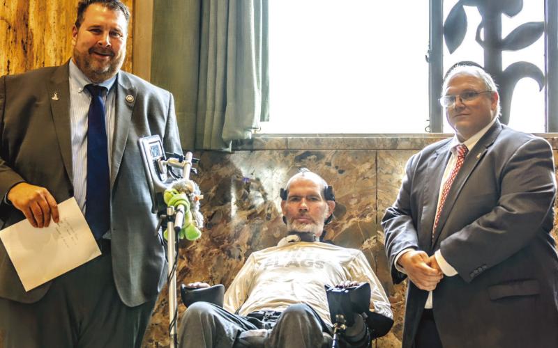 From left: Rep. John Illg Jr., Steve Gleason, and Rep. Mike Bayham.