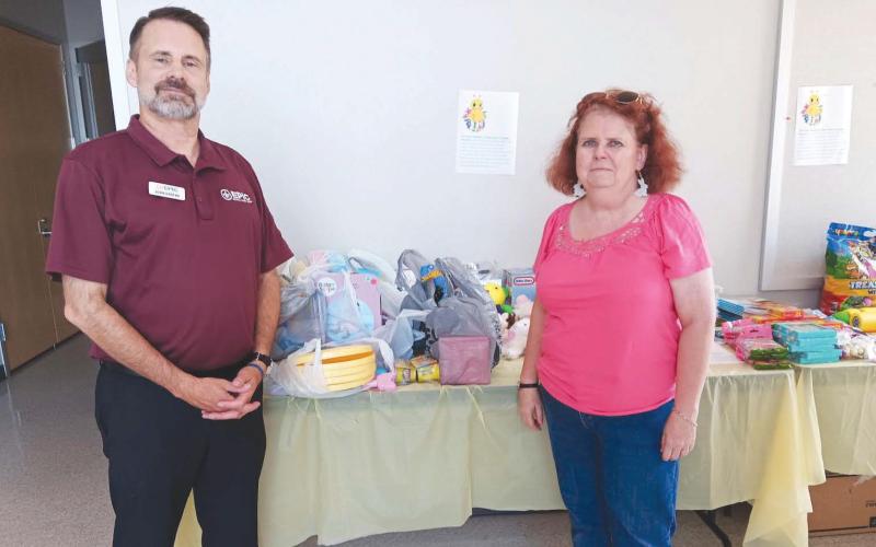 Nunez Community College sends a big Pelican 'thank you' to John Barthe and the crew at EPIC Federal Credit Union for making another massive donation to the college's Easter Basket toy and candy drive for the Family Violence Program Of St. Bernard. Each semester, the Nunez Chapter of Gamma Beta Phi Honor Society conducts a drive bene. ting kids in the Family Violence Program, and the Epic FCU sta routinely make large donations. Nunez thanks Epic FCU for their participation and support.