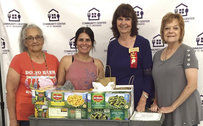 Upsilon Chapter of Delta Kappa Gamma Society International, as part of their 'Delivering Kindness Graciously' Project, donated food and toiletries to the Community Center of St. Bernard. The items were collected from members at the May 6 meeting held at the Kitchen Table Cafe in Arabi. Pictured, from left: Hope Larios, Jamie Richardson (Community Center Executive Director), Faith Moran, and Rosemary Gioia.