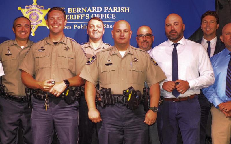 St. Bernard Sheriff’s Office deputies who received Medals of Achievement awards from Sheriff James Pohlmann are, from left: Dep. Gabriel “Trip” Roques III, Dep. Matthew Schmill, Sgt. Joe Warren and Dep. Thomas Gai, all of the Field Operations Bureau Patrol Division; and Agent Jules Martin Jr., Lt. Brad Nuccio, Sgt. Jonathan Smith, Lt. Clifford “Chip” Englande and Agent Patrick Clark, all of the Special Investigations Division Narcotics Unit.