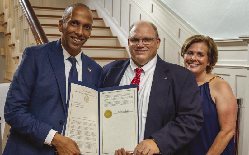 From left to right: French Consul General Rudolphe Sambou; State Representative Mike Bayham; Jennifer C. Burton.