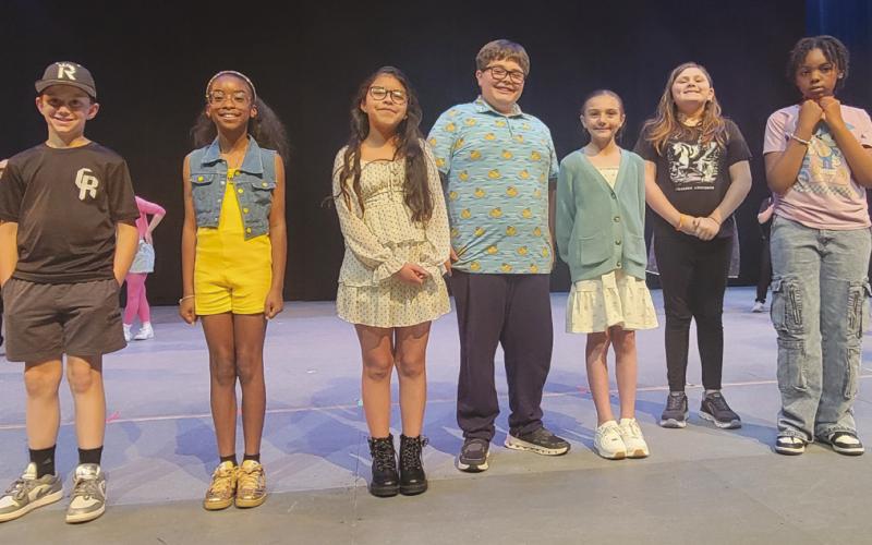 Young playwrights representing each public school were honored on stage.