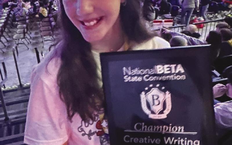 Lenna Moynan, a 5th grader at Lacoste, was named as theChampionintheCreative Writing Category for her original story, Unlikely.