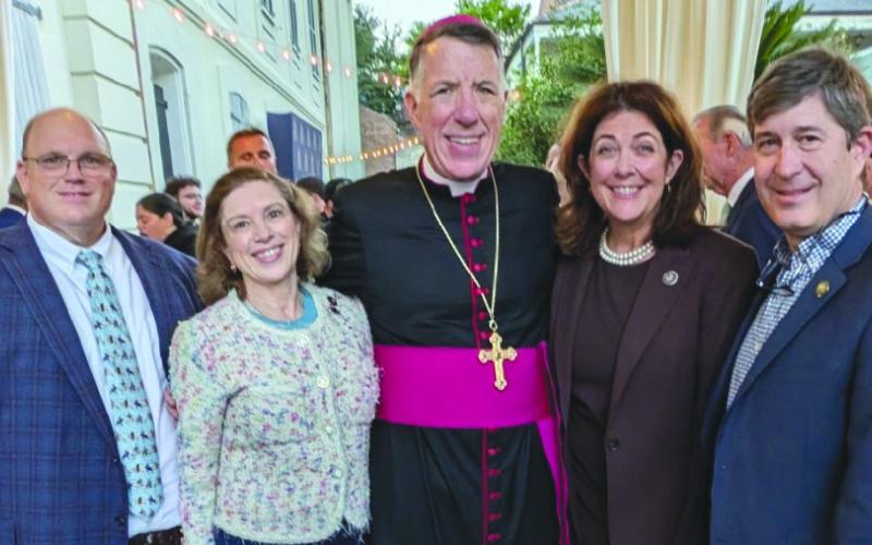 From left: Rep. Mike Bayham, Rep. Aimee Freeman, Archbishop James Checchio, Rep. Stephanie Berault, and Sen. Kirk Talbot.