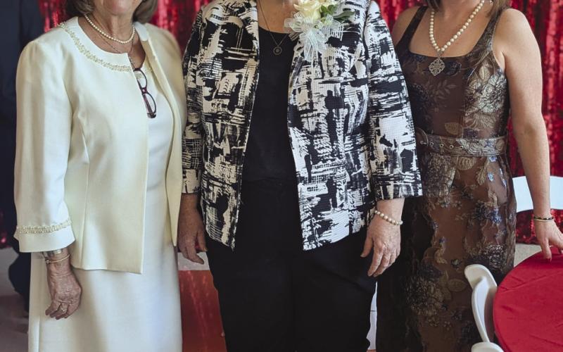 School Board members Diana Dysart and Dr. Katherine Lemoine commended Voitier on her leadership and guidance.
