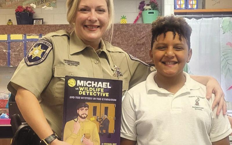 Dep. Victoria Courteaux, of SBSO's Corrections Division, participated in Joseph Davies Elementary School's Literacy Week.