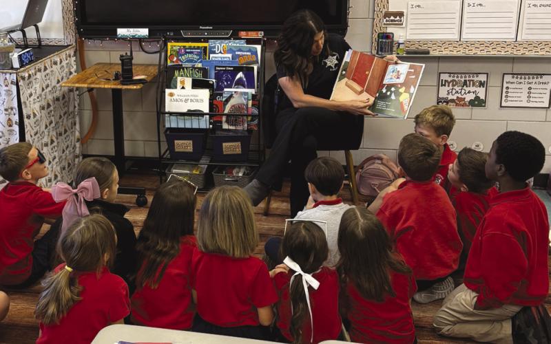 Detective Sgt. Jessie Gernados, of the SBSO Criminal Investigations Bureau, read to Joseph Davies Elementary students recently during Literacy Week.