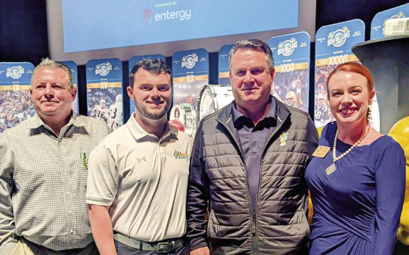 Above: From left are Director of Grants Jerry Graves, Assistant Baseball Coach Alex Powell, Head Baseball Coach Glenn Powell and Associate Vice Chancellor for Institutional Advancement Katherine Lemoine.