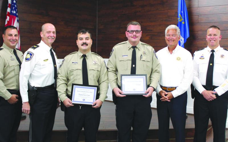 St. Bernard Sheri's Oce Dep. Trevor Lane and Dep. Chase Richard, both assigned to the Corrections Division at the St. Bernard Parish Prison, received Kiwanis Club of St. Bernard-Arabi Sammie Catalanotto LifeSaver Awards on Tuesday, July 8. At the ceremony are, from left: Lt. Justin Topey, of the Corrections Division; Col. Kevin Sensebe, commander of the Corrections Division; Dep. Lane, Dep. Richard, Sheri James Pohlmann; and Col. Daniel Bostic, commander of the Special Investigations Division.