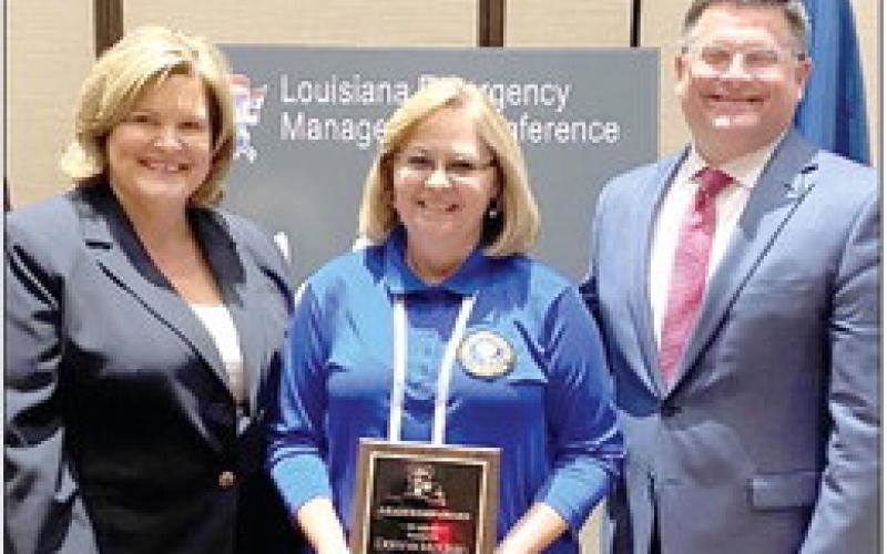 Pictured from left are Vicki Travis (LEPA President), Donna McClain and Casey Tingle (Director of the Governor’s Office of Homeland Security and Emergency Preparedness).