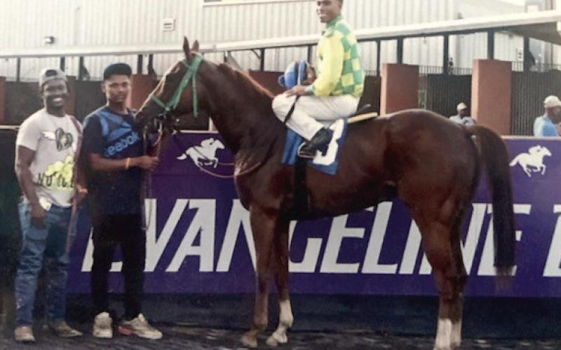 Nothing can be more rewarding than the winner circle for Kevin Williams with his racehorse, Permanent Detention.