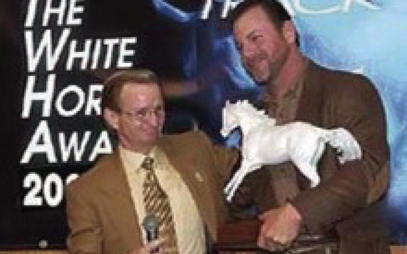 Louis Pomes receives a national award for animal welfare after Hurricane Katrina.
