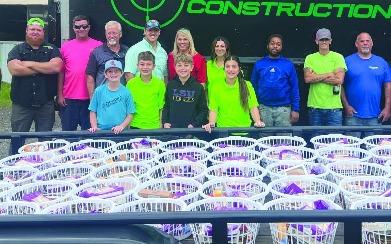 On Point Construction owners, employees and their children have been hand delivering Thanksgiving baskets throughout St. Bernard Parish to families in need for the past seven years.