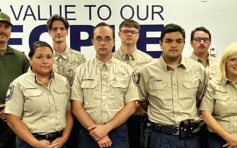 Pictured: instructors Maj. Dennis Morgan and Lt. Kyle Brown, graduates Dep. Shannon Schmiderer, Dep. Theodore Manint, Dep. Noah Hutchinson, Dep. Charles Migliore, Dep. Jose Laino, Dep. Jack Stogner and Dep. Victoria Courteaux, and instructors Sgt. Brandon Lewis and Dep. Darlene Ricks. Not pictured are: Graduates Dep. Javaughn Hill and Dep. Joseph Keen, and Instructors Lt. Jodie Couture and Sgt. Rosalyn Cantrell.