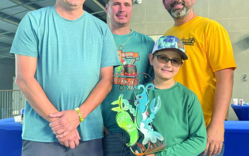 Third place winners of this year’s C.O.P.S. for Christmas Chili Cook Off fundraiser held Nov. 16 was the team from Gerald’s Donuts.