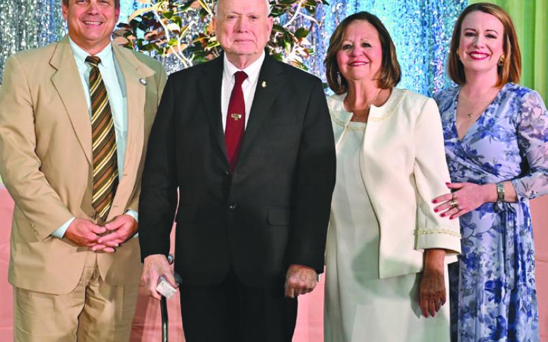 From left: Sean Warner, Retiree Wayne Warner, Diana Dysart, Dr. Katherine Lemoine. Photo by Raymar Photography