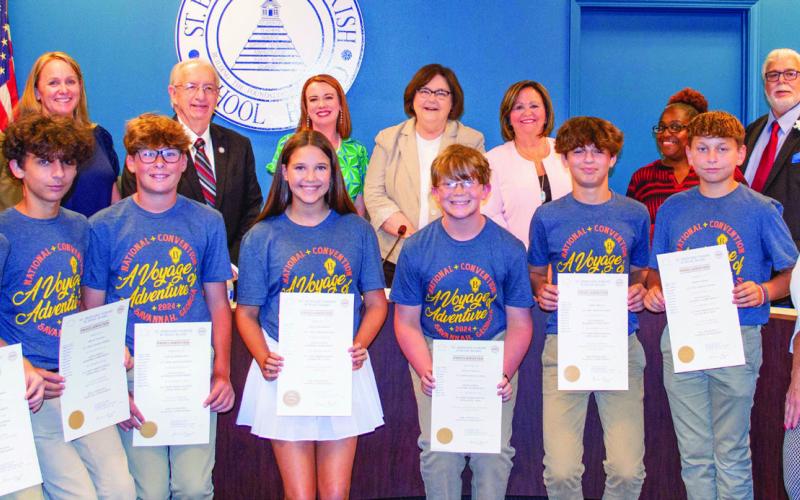 Pictured in the front row, from left: Wyatt Scully, Bryce Watson, Colton Bourgeois, Briley Blackwell, Jack McMullin, Caden Bryan, Preston Senez and Kara Colburn. Back row: Millie Harris, Donald Campbell, Carly Jackson, Joseph Long, Katherine Lemoine, Superintendent Doris Voitier, Diana Dysart, Keisa Rodney, Henry Rodriguez III, Sean Warner and Rosiland White.