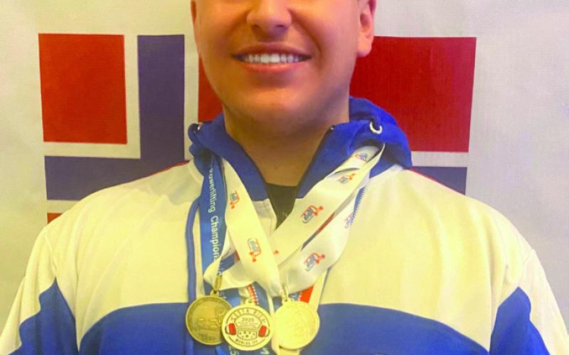 St. Bernard Native and Holy Cross Graduate Earns Silver at Powerlifting World Championships
