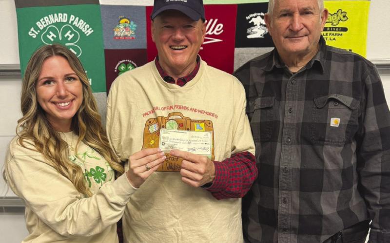 Pictured from left to right are St. Bernard Parish 4-HAgent Gabrielle Guerra, community supporter Michael Chutz, and St. Bernard Parish 4-H Agent Wayne Burgess.