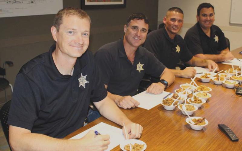 St. Bernard Sheri's Oce deputies joined in the fun as judges at Valero Meraux Refinery's Jambalaya and Gumbo Cook-O. Pictured are, from left: Chaplain Aaron Johnson, and Maj. Justin Meyers, Maj. Chad Silcio and Sgt. Jerey Babin of the Corrections Division.