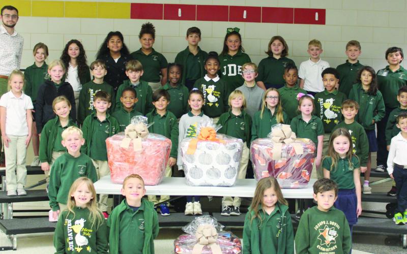 The Joseph Davies Elementary Pelicans hosted a Thanksgiving Food Drive from October 13 to November 10. The students collected over 500 non-perishable food items and were able to make 13 Thanksgiving food baskets for needy families in the Davies community. Turkeys were also donated. Each family received a turkey and a basket filled with non-perishable food items. We are so thankful and proud of our Davies Pelicans for making this food drive such a huge success.