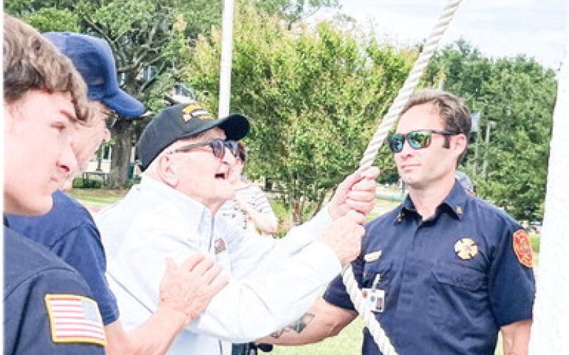 World War II Veteran Eddie Tresch (Merchant Marine) ringing the Liberty Bell.