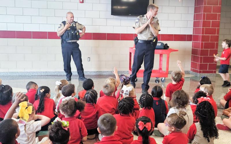 St. Bernard Sheriff’s Office Lt. Eric Eilers, supervisor of Community Relations, and Dep. Aaron Johnson, who also serves as chaplain, recently spent time with Lacoste Elementary School pre-kindergarten students. Lt. Eilers and Dep. Johnson spoke to the students about some of the special equipment used by deputies and what they do to keep our parish safe. Different classes of students pictured below with Lt. Eric Eilers and Dep. Aaron Johnson.