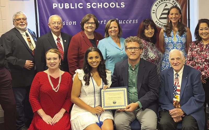 Abadie with Dr. Brian Beabout (front row, center) are pictured with the members of the St. Bernard School Board.