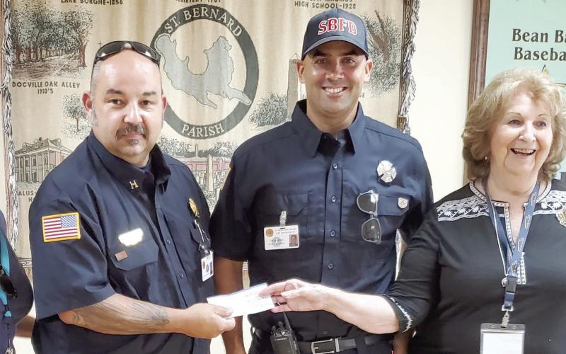 On August 26, the AARP Chapter 3926 presented a donation to the St. Bernard Fire Department for their Muscular Dystrophy Boot Drive. Per Caption Richard Steele, their Boot Drive will be held Oct. 6-8. Please stop at the traffic light at Judge Perez &amp;amp; Packenham to donate for such a worthy cause. Pictured, from left: Glenda Fedele, (AARP Treasurer), Capt. Richard Steele, Capt. Desi Romano and Leona Galley (AARP President).
