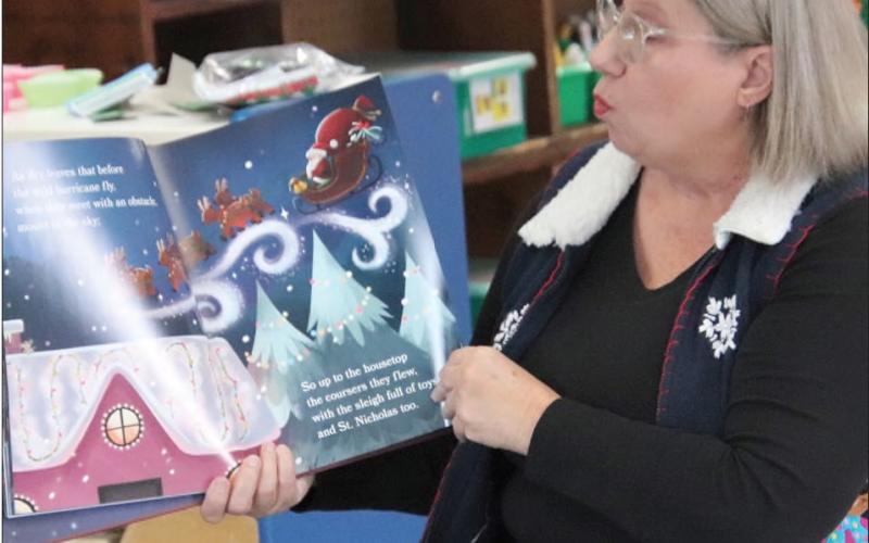 The Kiwanis Club of St. Bernard has many reading programs in the schools and at various daycares throughout the St. Bernard Parish. Brenda Peralta reads The Night Before Christmas to the children at Kids Kampus Learning Center on Dec. 5. The Kiwanis Club is always seeking new members to assist with the many programs in the schools and community. To obtain information about our club and programs or to join, contact Robby Showalter at 504.616.7312.