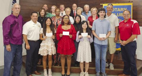 Members of the Rotary Club of St. Bernard pose with this year's scholarship recipients from Chalmette High and their family members during the club's scholarship presentation. Scholarship recipients are Lillian Lai, attending the University of Texas; David England, attending the University of Texas; Celine Bioc, attending the University of Notre Dame; and Destiny Bullock, attending the Massachusetts Institute of Technology.