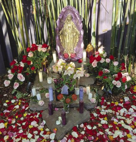 The statue of the Blessed Virgin Mary that was blessed this past Saturday. For those who attended, it was a renewal of faith. The beautiful rose decorations were arranged by Myrna Hinyub and what a talent she was at the event with her many home cooked dishes served.