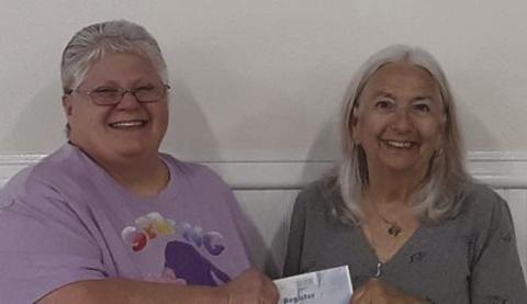 NARFE Vernon N. Landry St. Bernard Chapter 1398 Treasurer Sylvia Keller is pictured here (on the right) presenting Laura Napolitano, Chapter Alzheimer’s Coordinator, with a check for $2,000 in contribution to the NARFE Alzheimer’s Fund. Since 1985, NARFE has supported research into the cause, prevention, and treatment ofAlzheimer’s disease, and has donated more than $15,000,000, thus far.