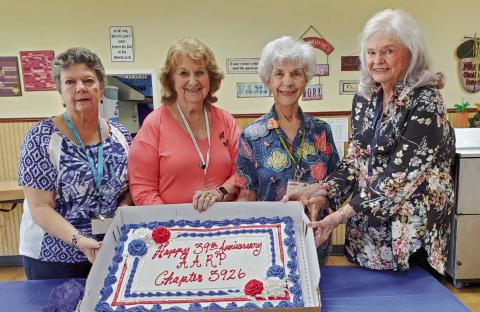 On Saturday, June 22, AARP Chapter 3926 celebrated it's 39th year anniversary with a luncheon for all of it's members. Officers pictured, from left, are Glenda Fedele (Treasurer), Leona Galley (President), Carolyn Constance (Secretary) and Terry Heidel (Vice President). The club sends thanks to Breaux Mart for their beautiful anniversary cake.
