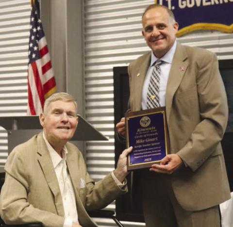 Mike Ginart, Jr. receiving the Kiwanis Circle of Friends Award, presented by Kiwanis Board Member and Terrific Teacher Program Chair, Kevin Hoffman.