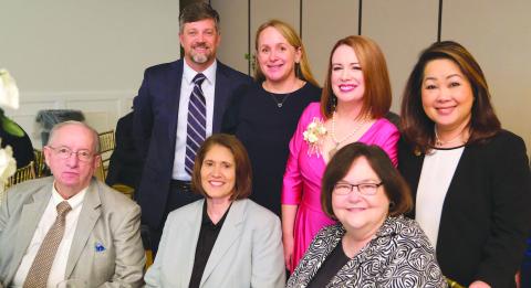 Front Row Left to Right: School Board Member Joseph Long, Deputy Superintendent Mary Lumetta, Superintendent Doris Voitier, Second Row: Director of School Operations Jason Dewey, School Board Member Carly Creason, Woman of the Year Katherine Lemoine, School Board Member Kelly Le-Bowman.