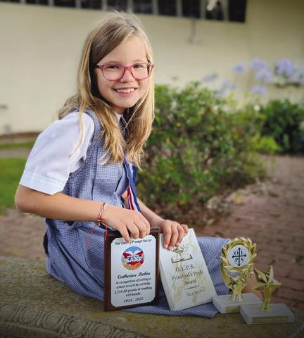 Catherine Robin, a 9-year-old student from Our Lady of Prompt Succor School in Chalmette, broke the national record for points earned in a single school year in the Accelerated Reader program after reading more than 600 books in the third grade.