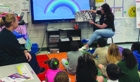 SBSO’s school liaison investigator Lt. Michelle Canepa shared a story with Arabi Elementary School students during Literacy Week.