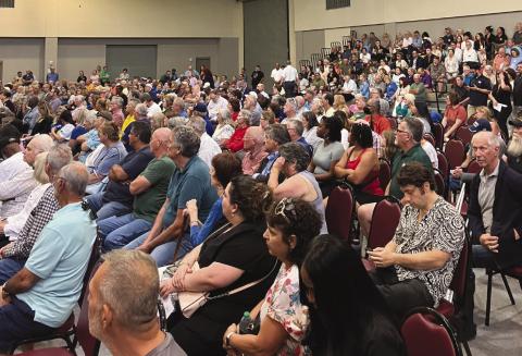 Residents pack into Val Reiss Sports Complex to participate in USACE public hearing on LIT permit.