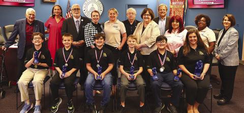 'AGLOA Elementary Division' Left to right- Front Row: Jonah Capstick, Michael Leggett, Theodore Schilling, Dominick Shreve, Andy Do, Melinda Hall. Second Row: Don Campbell, Millie Harris, Henry Rodriguez, Katherine Lemoine, Carly Creason, Joe Long, Doris Voitier, Sean Warner, Rosiland White, Keisa Rodney, Mary Lumetta