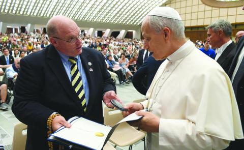 Representative Mike Bayham (left) talking with Pope Leo XIV (right) in Rome.