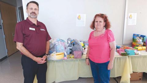 Nunez Community College sends a big Pelican 'thank you' to John Barthe and the crew at EPIC Federal Credit Union for making another massive donation to the college's Easter Basket toy and candy drive for the Family Violence Program Of St. Bernard. Each semester, the Nunez Chapter of Gamma Beta Phi Honor Society conducts a drive bene. ting kids in the Family Violence Program, and the Epic FCU sta routinely make large donations. Nunez thanks Epic FCU for their participation and support.