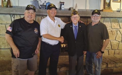 Pictured from left: Chaplain Jim Phillpott, Commander Benny Becnel, Guest Speaker SGT George E. Van Zandt (103 year old WWII Veteran), and Historian Ricky Vergona.